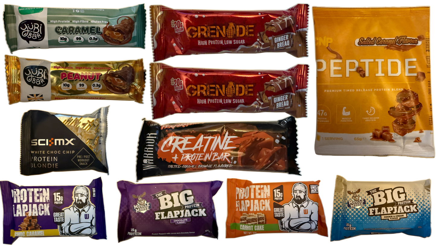 protein snack box, healthy, snacks, training, running, fuel, creatine bar, warrior, grenade protein bar, flapjack, uncle jack, muscle moose snack, sci mx blondie snack all spread out